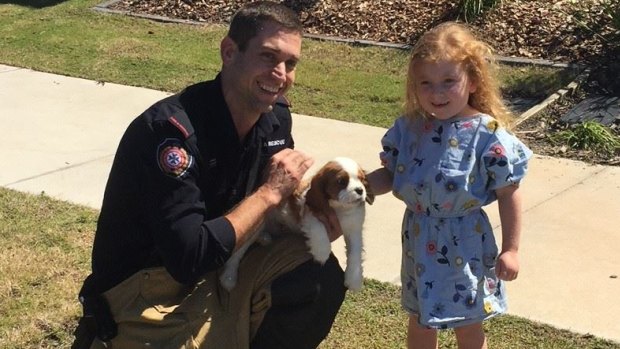 Jackson with his young owner and firefighter Craig Robinson.