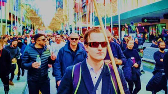 Harrison Mclean (front) was charged by police after the Melbourne lockdown protest rally on September 18.  