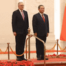 Anthony Albanese and Li Qiang inspect troops in Beijing before a formal meeting.