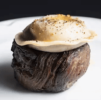 Bistecca al pepe - eye fillet steak topped with a pepper sauce-filled raviolo - at Gambino restaurant in Glen Waverley.