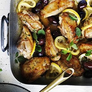 Braised chicken with lemon, oregano and olives.