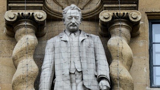 Oxford University's Oriel College with a statue of Cecil Rhodes