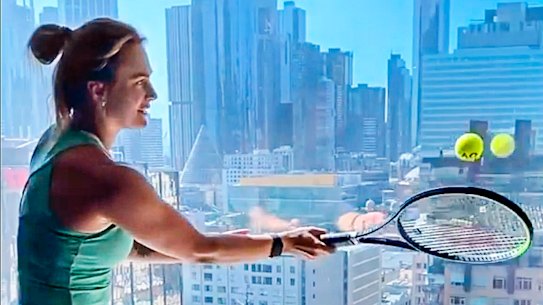 Belarusia's Aryna Sabalenka practises volleying with a view at the Grand Hyatt in Melbourne.  