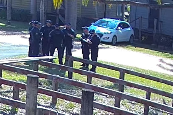 Police raid the Connect Global premises.