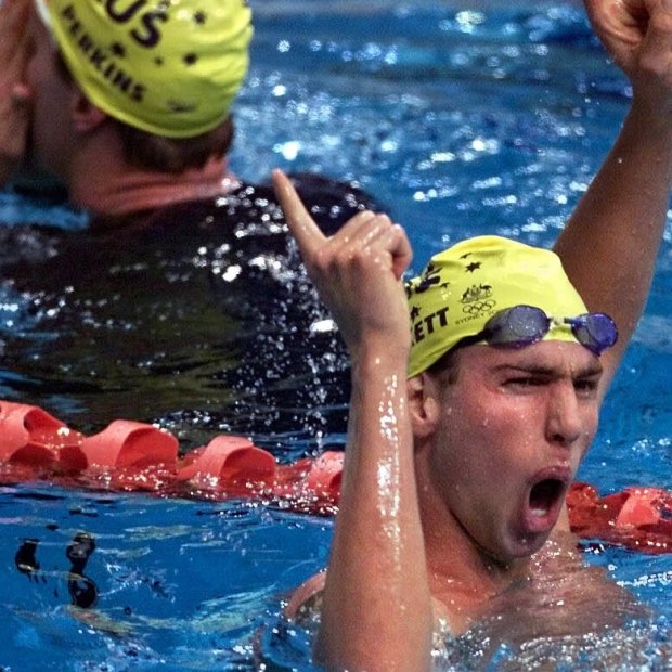 Hail the new king: Grant Hackett wins the 1500m in Sydney, with Kieren Perkins collecting silver.