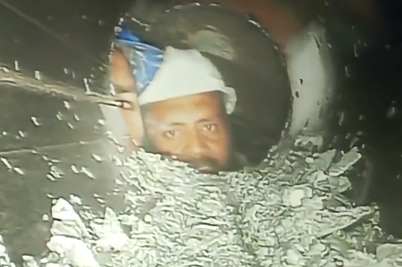 A still from endoscopic camera footage showing two of the trapped men.