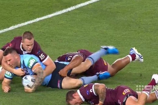 The Queensland hooker hit the deck hard after being steamrolled by Nathan Brown.