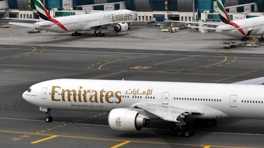 An Emirates plane taxis to a gate at Dubai International Airport at Dubai International Airport in Dubai, United Arab Emirates. 