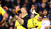 Ruben Love of the Hurricanes attempts to take a high ball.Ruben Love of the Hurricanes attempts to take a high ball.