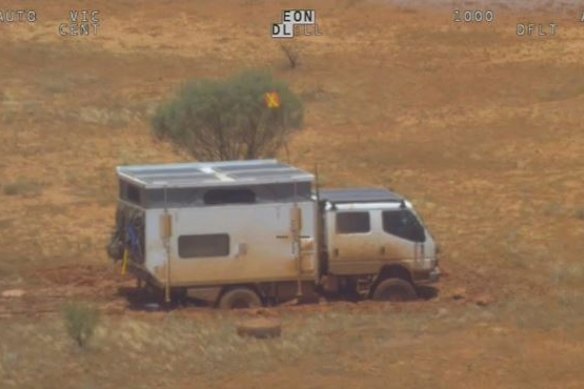 The bogged van. 