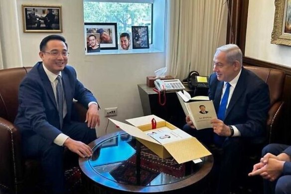 Israeli Prime Minister Benjamin Netanyahu with Chinese President Xi Jinping’s book in July. 