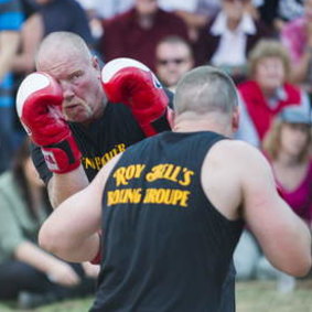 Tent boxers, like media commentators, know how to throw a punch then cover up. Canberra Show, 2013. 