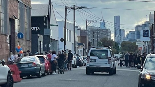 An event in Richmond on Saturday with people gathered on the street.
