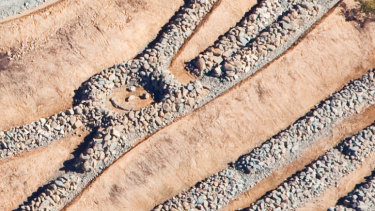 The Cotter Dam’s giant smiley face just days before it was submerged in August 2014.