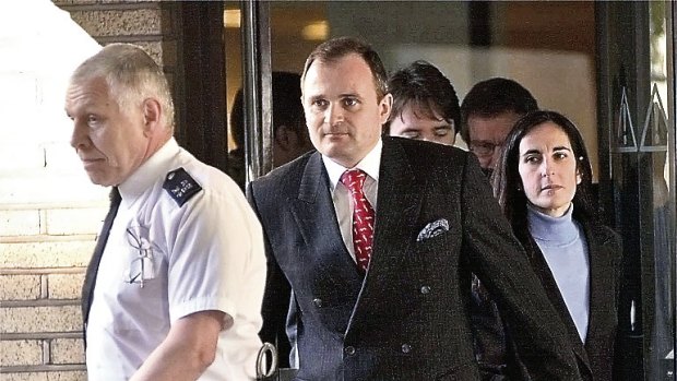 British Army major Charles Ingram and his wife Diana leave Southwark Crown Court in London, April 7, 2003.