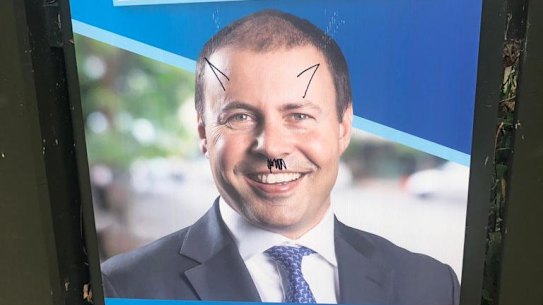 Campaign ads for Treasurer Josh Frydenberg have been defaced in Kooyong.