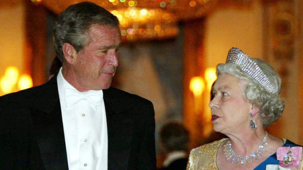 Former US President George W. Bush with the Queen at a state banquet she hosted in his honour at Buckingham Palace in 2003.