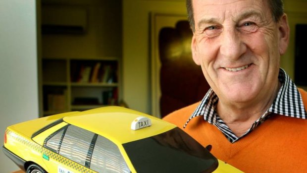 Former Liberal premier Jeff Kennett in 2012 with a taxi given to him by the industry during his reign.