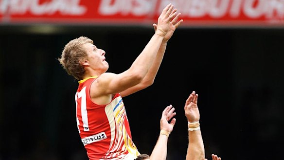 Going up. Daniel Gorringe flies for a spectacular mark.