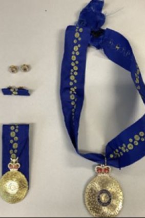 Police found replica medals in a search of the man’s residence. 