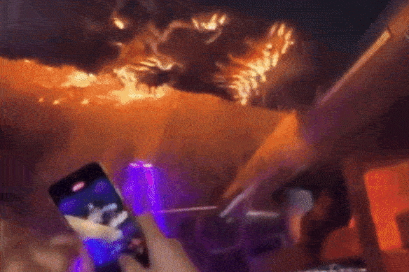 Social media footage showed the early stages of the fire as it spread across the ceiling.