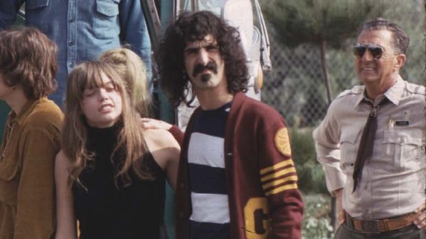 Frank Zappa with Gail Zappa and The Mothers of Invention on the road.