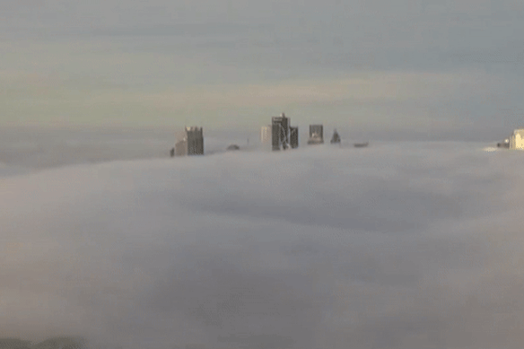 Webcam footage shows heavy fog moving across the CBD.