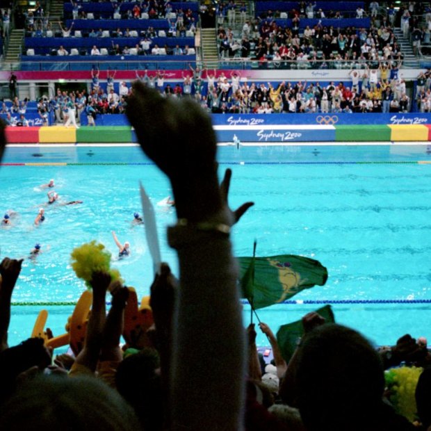 The crowd goes wild as Australia scores the goal to seal the gold medal. 