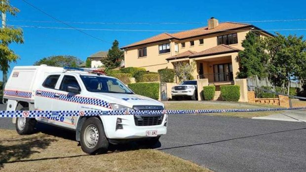 Police at Toutai Kefu’s Coorparoo home on Monday morning.