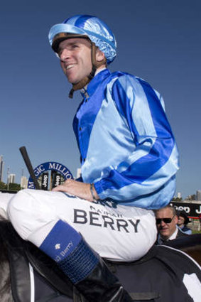 Nathan Berry riding Unencumbered at the 2014 Jeep Magic Millions at the Gold Coast turf club.