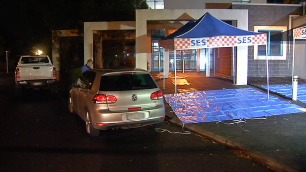 The 27-year-old man was stabbed in the forearm and leg outside Glen Waverley police station.
