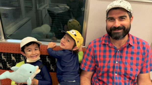 Matt Gale with his two boys, Jun and Ren, on their way to Universal Studios in Osaka, Japan.