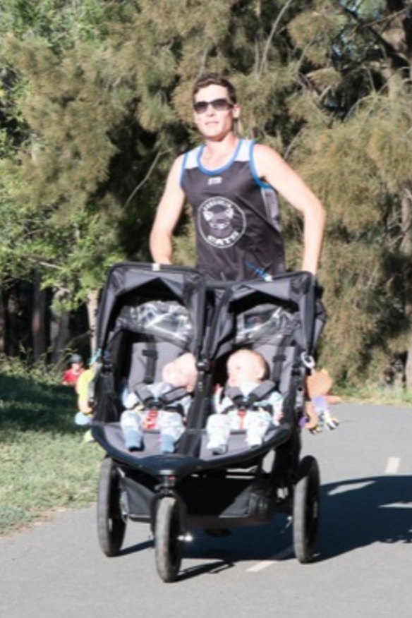 Canberra dad Luke Greenhalgh training with the twins Dahli and India.