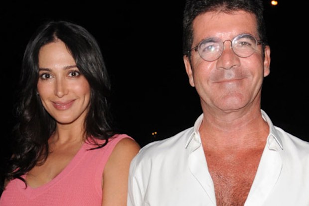 Simon Cowell with girlfriend Lauren Silverman. (Getty)