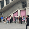 People queueing for food in Sydney.