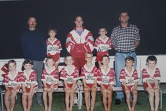 A young Daly Cherry-Evans (fourth from rfight) with his father Troy (red jacket, back row) in 1996.