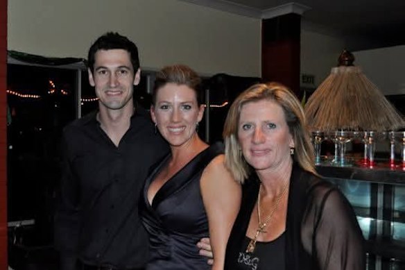 Carolyn Taylor and her now-husband Neil celebrating their engagement with her mum Dawn at the Albany Links restaurant.