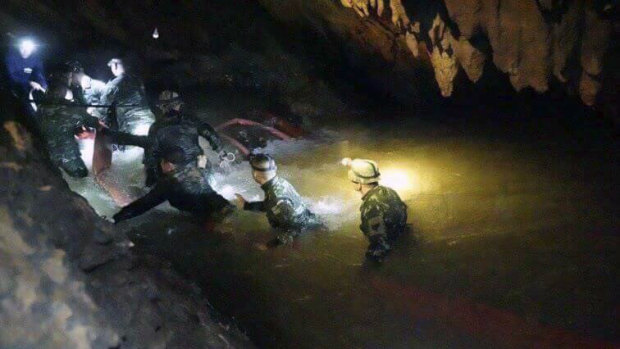 Thai rescue teams search inside cave complex.