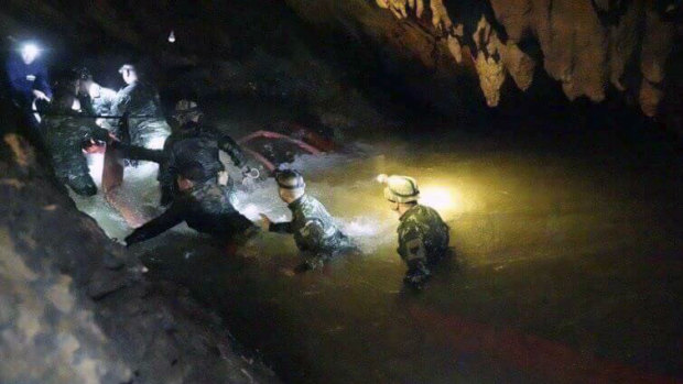 Thai rescue teams search inside cave complex.