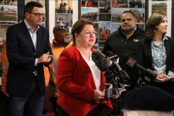 Premier Daniel Andrews, former Essendon great Michael Long (in the Raw jacket) and former Aboriginal affairs minister Natalie Hutchins (centre).