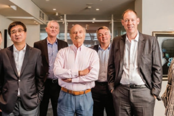 In happier times, Phoslock former chief executive Robert Schuitema (front row, right), former chairman Laurence Freedman (centre) and former deputy chairman Zhigang Zhang (front row left).