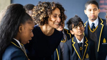 Katharine Birbalsingh with students at the Michaela Community School in London.