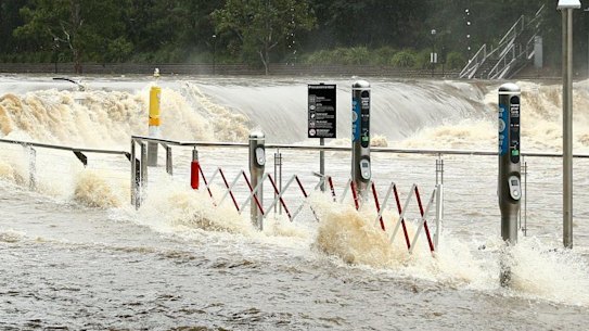 Parramatta ferry wharf overflows and floods due to continuous and heavy rain on March 20.