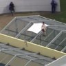 Brisbane prison in lockdown as inmates climb onto roof