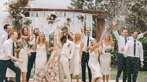 The wedding party at Scott "Jimmy Niggles" Maggs' wedding with Emma Metcalf at Stanwell Tops on March 6 where 37 guests have since been diagnosed with COVID-19.