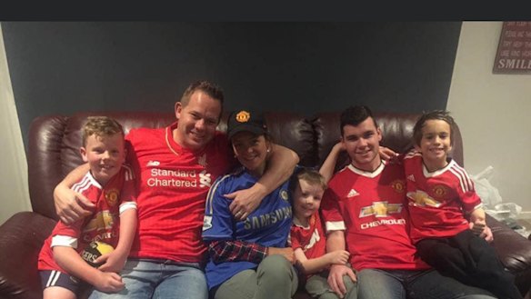 Sean Simpson with his wife Vanessa, step-son Jacob Marchett and his siblings.