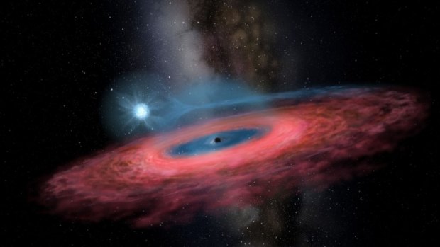 An artist's rendition of LB-1, a massive black hole discovered by scientists in the Milky Way Galaxy.