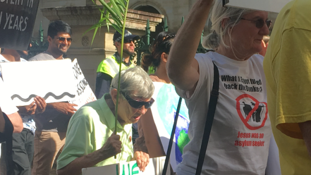 The Palm Sunday rally called for detention centre closures. 