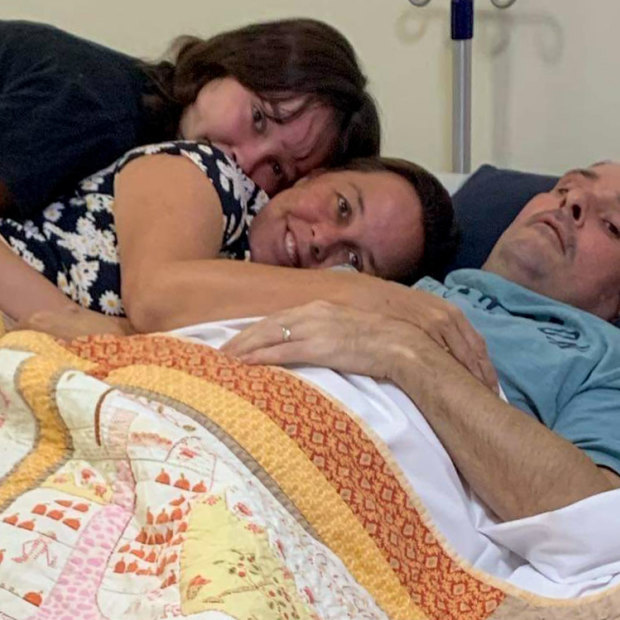 A quick decline: Brian McLoed with his family at the Canossa Palliative Care at Oxley.