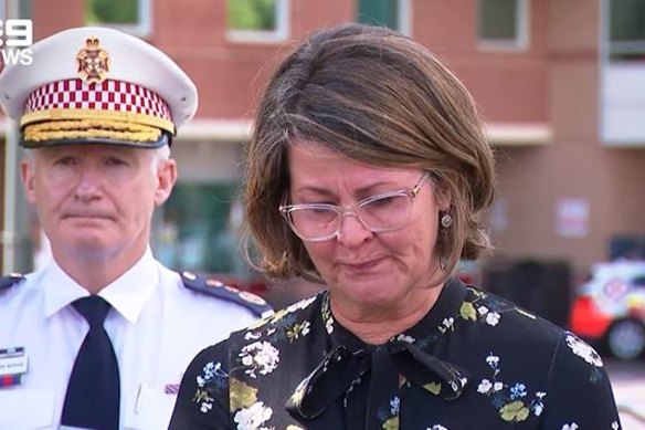 NSW Health Secretary Susan Pearce chokes back tears as she expresses her condolences to the paramedic’s wife and family.